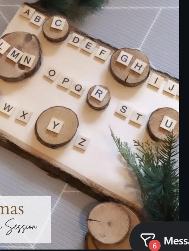 Wooden letter tiles on wood slices